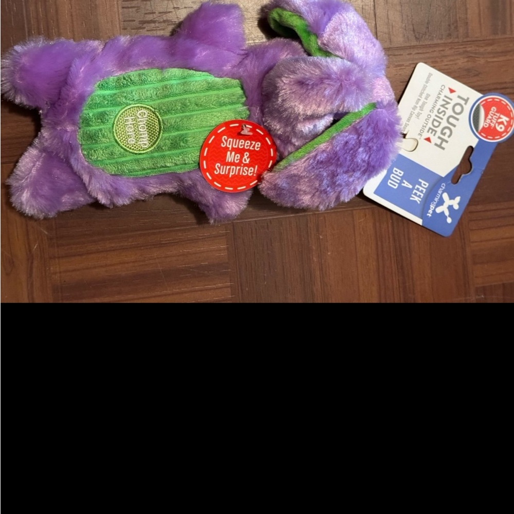 Purple Plush Dog Toy with Green Accents